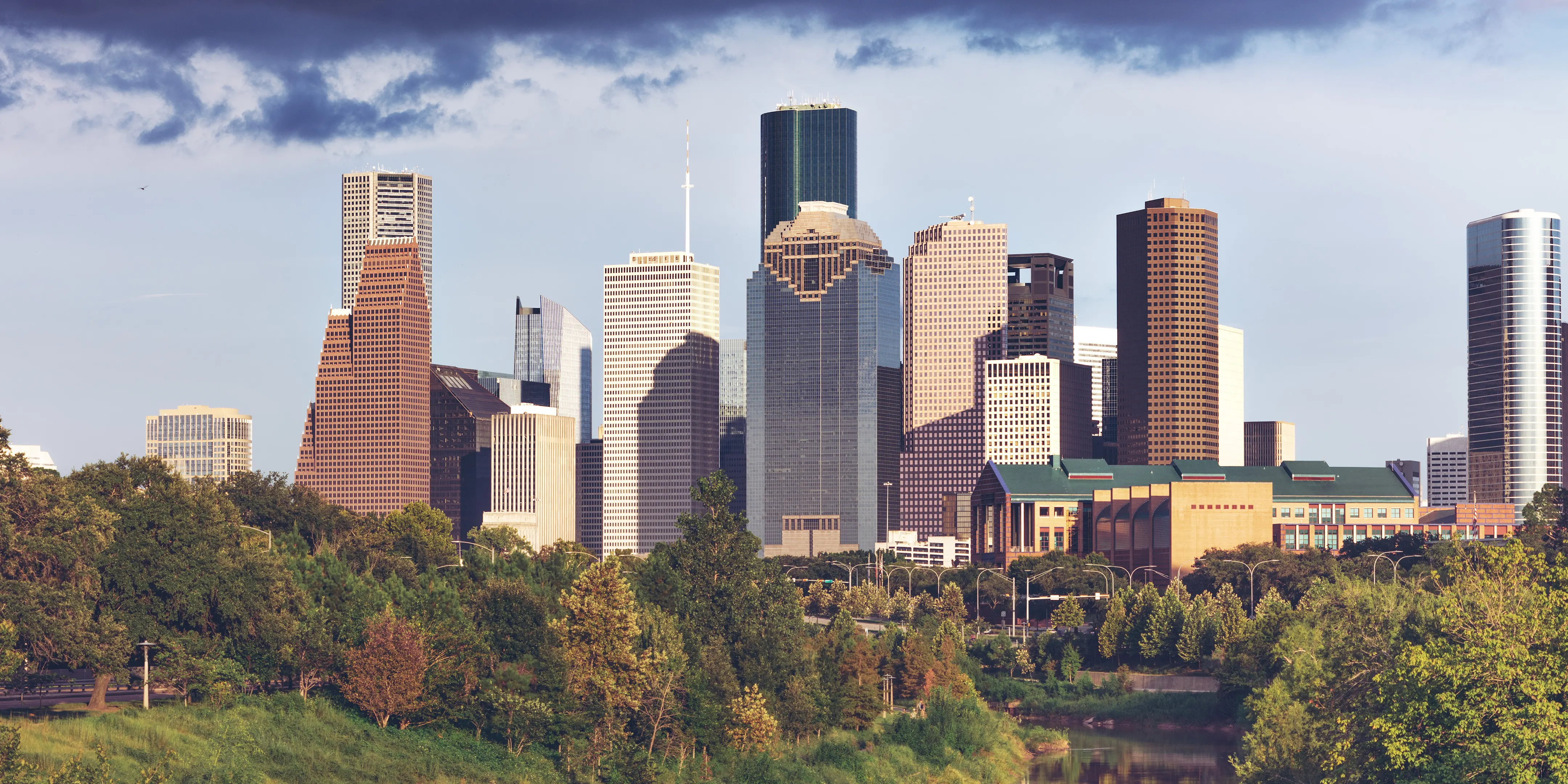 Downtown Houston skyline above the trees of Buffalo Bayou